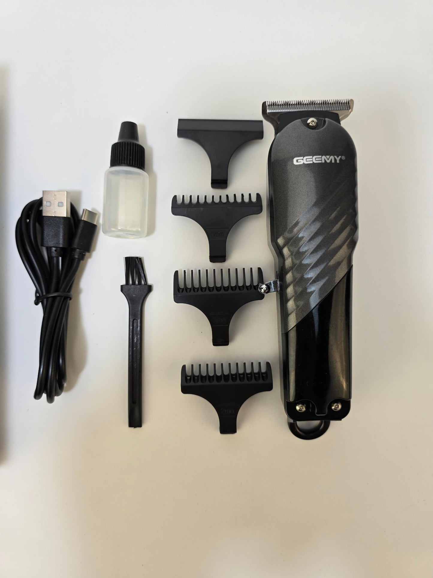 Geemy GM-6717 Hair Trimmer | Hair Trimmer With 600mAh Power Battery - khan American Tools