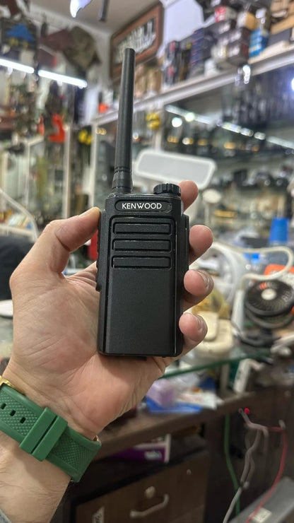 Close-up of Kenwood TK-C1 radio showing LED flashlight and speaker grill